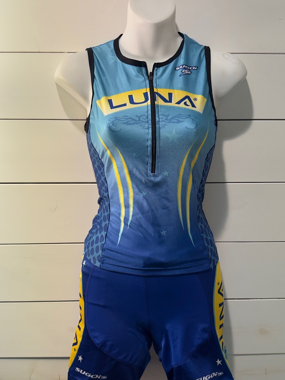 SUGOI Blue Cycling Jersey with Yellow Accent